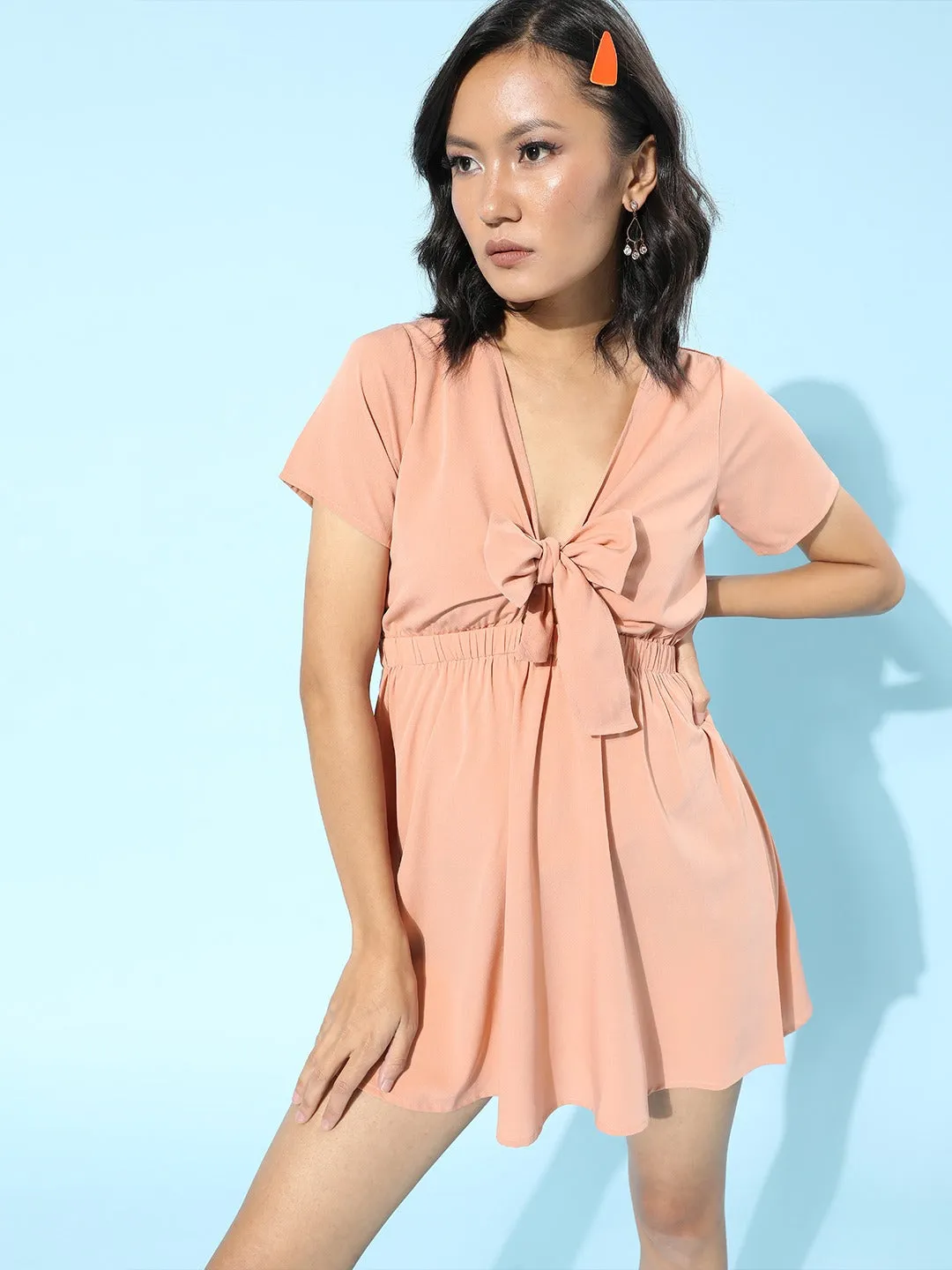 Berrylush Women Solid Pink V-Neck Front Tie-Up Crepe Smocked A-Line Mini Dress